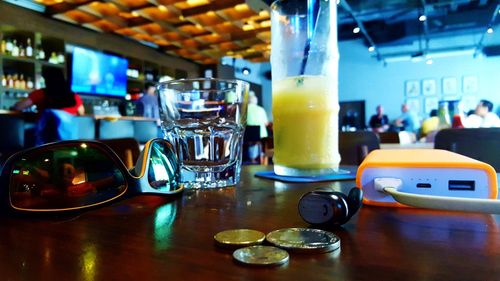 Close-up of beer glass on table at restaurant