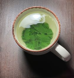 Green tea served on table