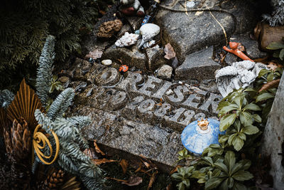 High angle view of text on rock