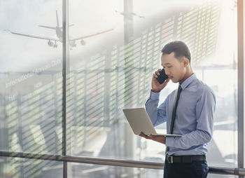 Young man using mobile phone