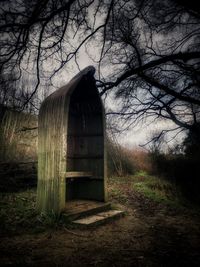 View of abandoned house in forest