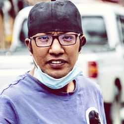 Portrait of man wearing eyeglasses