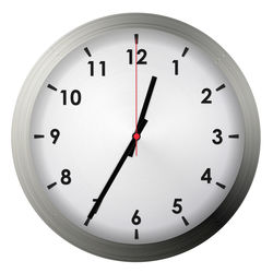 Close-up of clock over white background