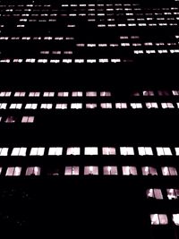 Low angle view of illuminated building at night