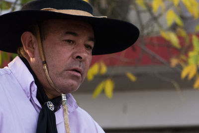 Portrait of man wearing hat