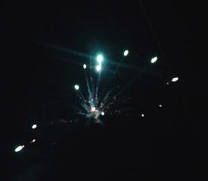 Firework display at night