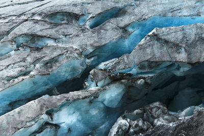 Fragment of a glacier with cracks