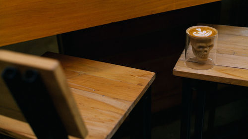 High angle view of beer glass on table at restaurant