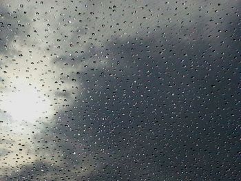 Close-up of water drops on glass