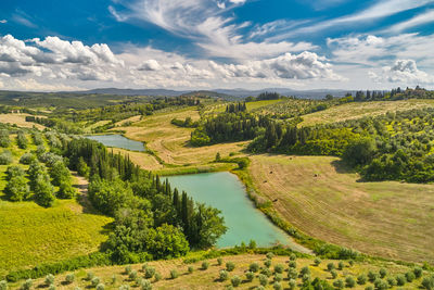 Scenic view of rural landscape against sky. tuscany countryside in italy