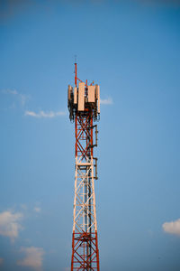 Low angle view of crane against clear sky