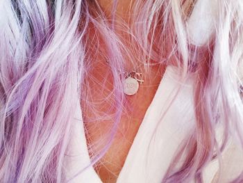 Close-up of woman with purple hair