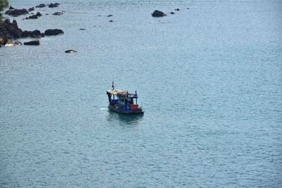 High angle view of ship sailing on sea