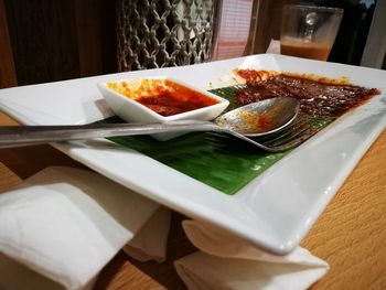 Close-up of food in plate on table