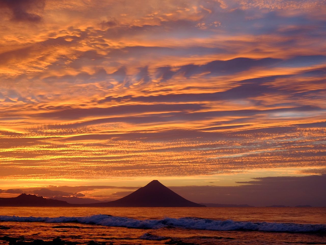 sunset, sky, scenics - nature, beauty in nature, cloud - sky, orange color, tranquil scene, water, sea, tranquility, idyllic, nature, dramatic sky, non-urban scene, mountain, waterfront, no people, silhouette, land, outdoors, horizon over water