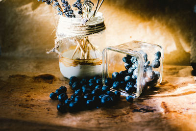 Close-up of glass jar on table