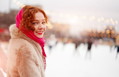 Portrait of smiling woman during winter