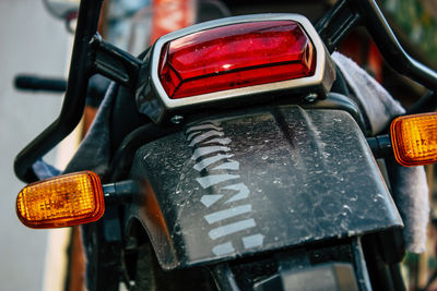 Close-up of motorcycle on road