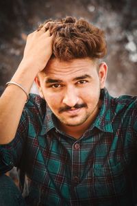 Portrait of young man smiling