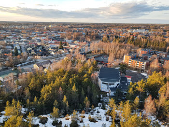 High angle view of townscape against sky during autumn