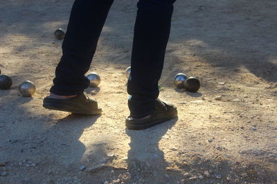 Close-up of person standing in water