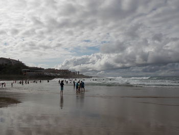 Tourists enjoying on beach