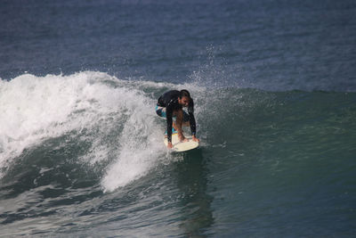 Man surfing in sea