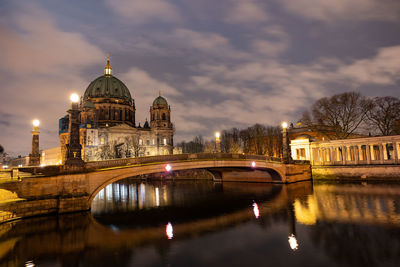 Illuminated buildings in water