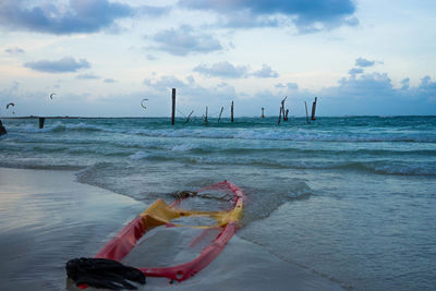 Scenic view of sea against cloudy sky