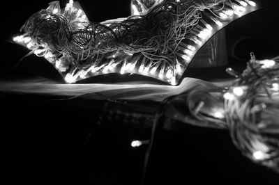 Close-up of illuminated electric lamp