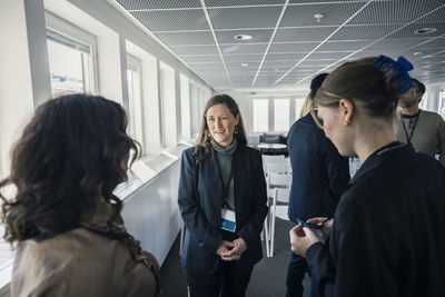 Group of business people during conference break