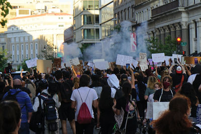 People walking on street in city