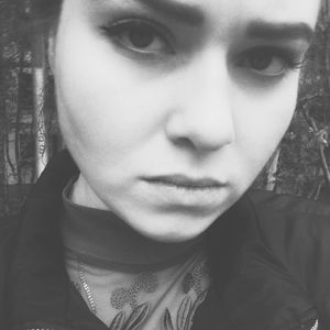 Close-up portrait of young woman