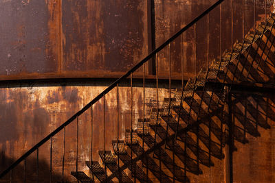 Shadow of railing on staircase