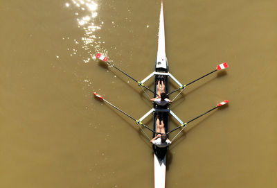 Overhead view of boating at calm lake