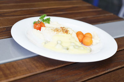 Close-up of breakfast served on table