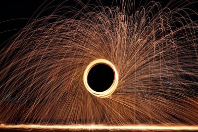 Blurred motion of wire wool spinning at night