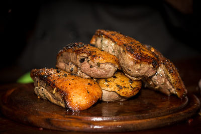 Close-up of meat on barbecue
