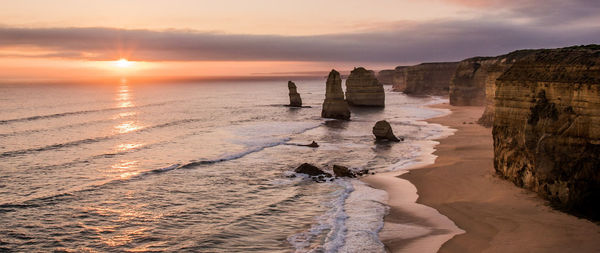 Scenic view of beach during sunset