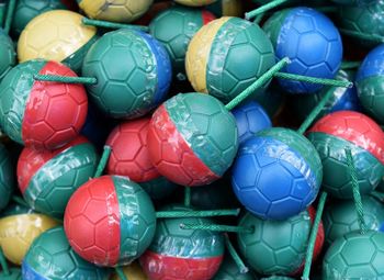 Full frame shot of colorful soccer ball firecracker pile