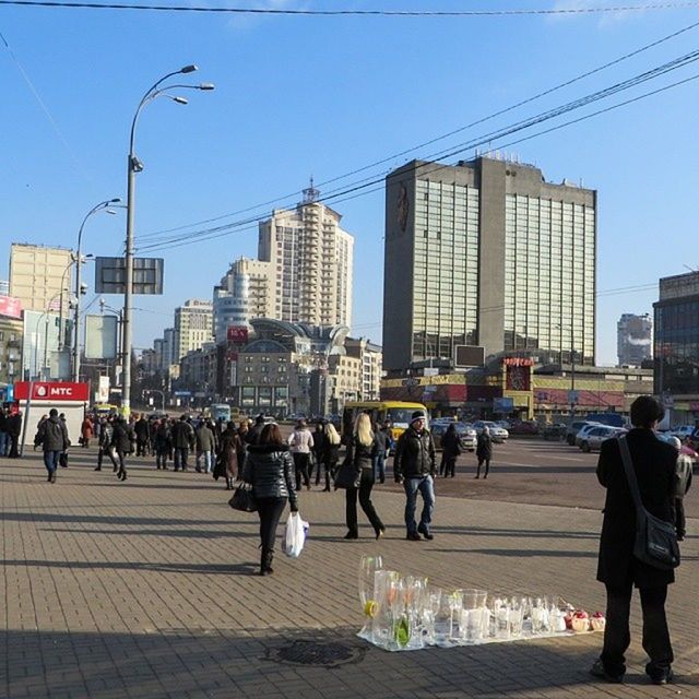 PEOPLE WALKING ON CITY STREET