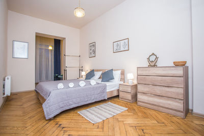 Tables and chairs on bed at home
