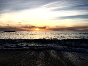 View of calm sea at sunset