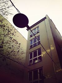 Low angle view of street light against sky