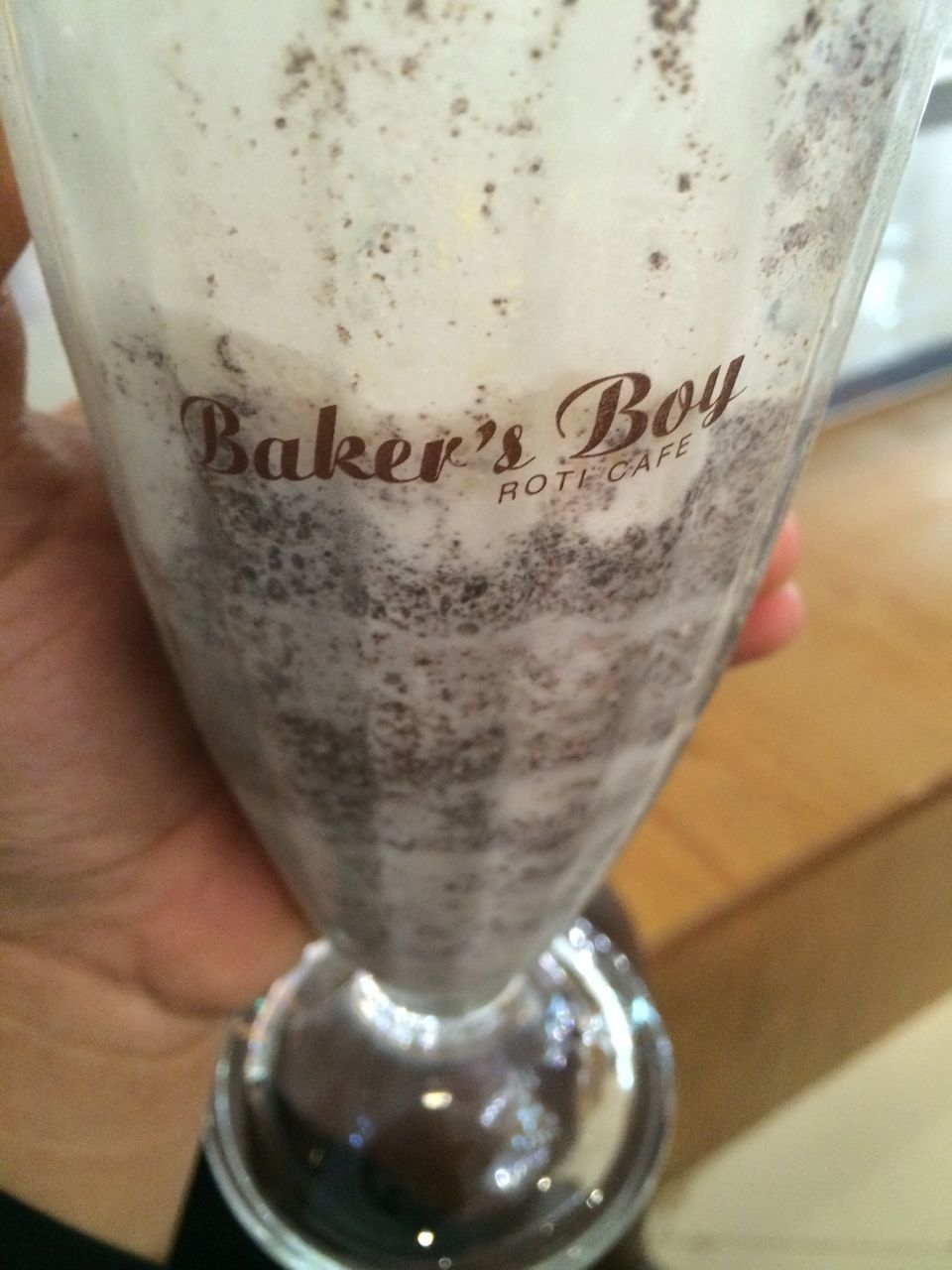 drink, refreshment, food and drink, close-up, indoors, drinking glass, freshness, glass - material, alcohol, focus on foreground, person, part of, transparent, frothy drink, table, cropped, glass