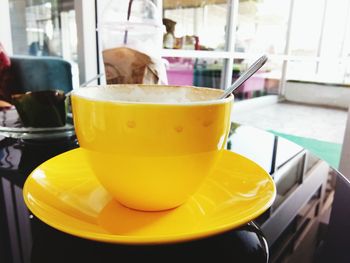 Close-up of yellow juice on table