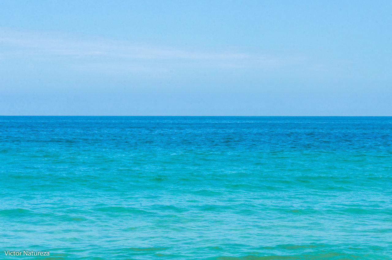 sea, horizon over water, beauty in nature, water, scenics, nature, blue, tranquil scene, tranquility, no people, idyllic, sky, outdoors, day, rippled, waterfront, clear sky