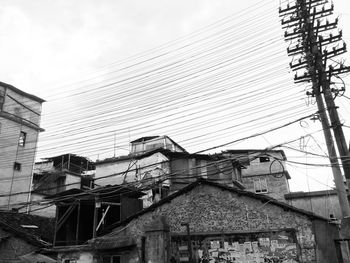 Low angle view of houses against sky