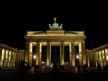 Low angle view of historical building at night