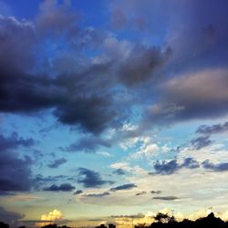 Low angle view of dramatic sky during sunset